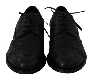 Blaue Oxford-Schuhe aus Leder mit Flügelkappe