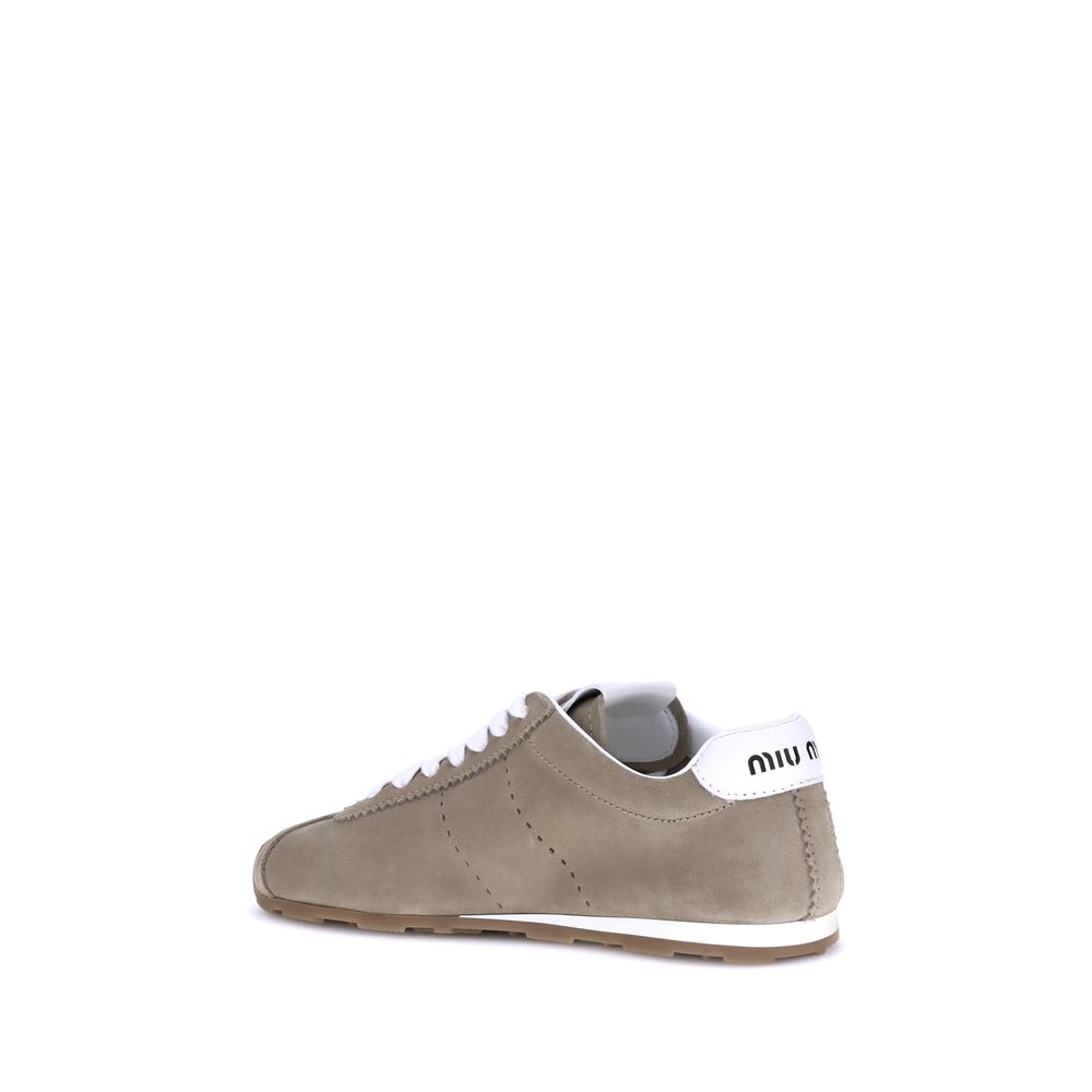 Sneakers aus Wildleder mit Federn