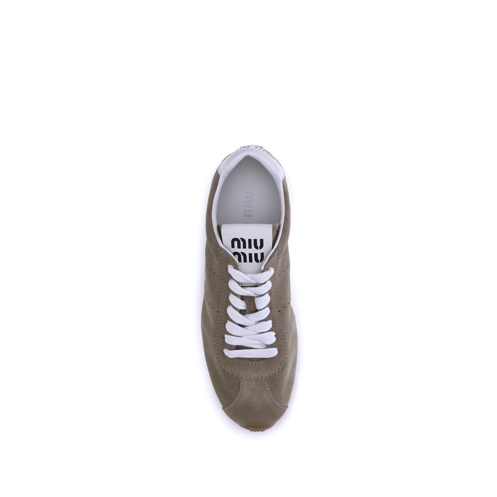 Sneakers aus Wildleder mit Federn