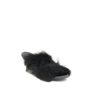 Fur-trimmed mules Sandals